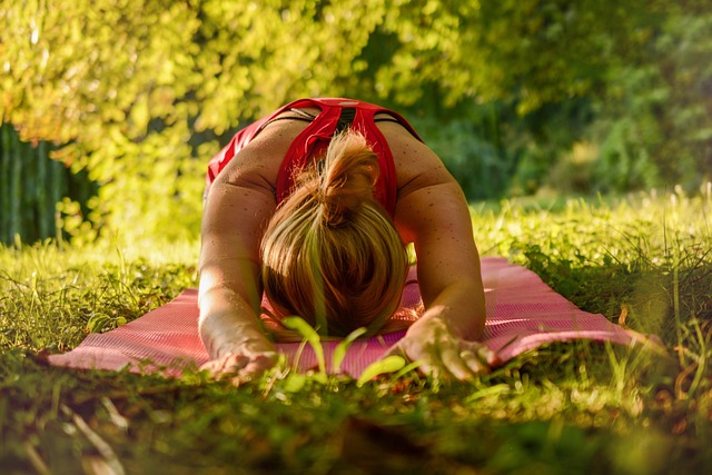 healthy morning routine with stretching near window and notebook planning